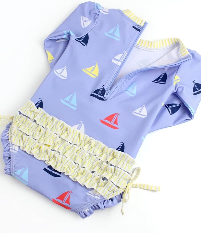 RuffleButts Baby Girls UPF 50+ Sun Protection Novelty Print Long Sleeve One Piece Rash Guard Swimsuit with Zipper
