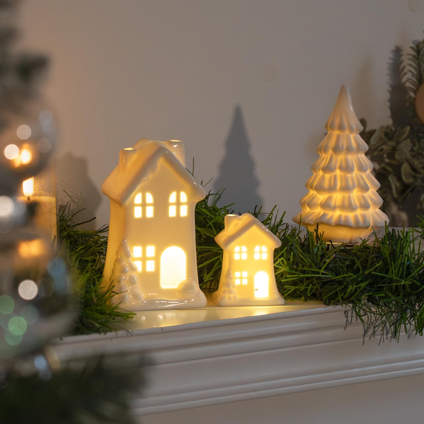 Nerosun Ceramic Christmas Village Houses 3Pcs Led Lighted Porcelain White Small House And Xmas Tree Tabletop Figurines Light Up Christmas Decorations For Home Shelf Cabinet Table Winter Decor