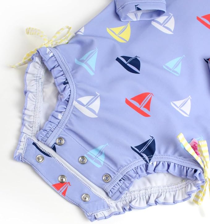 RuffleButts Baby Girls UPF 50+ Sun Protection Novelty Print Long Sleeve One Piece Rash Guard Swimsuit with Zipper