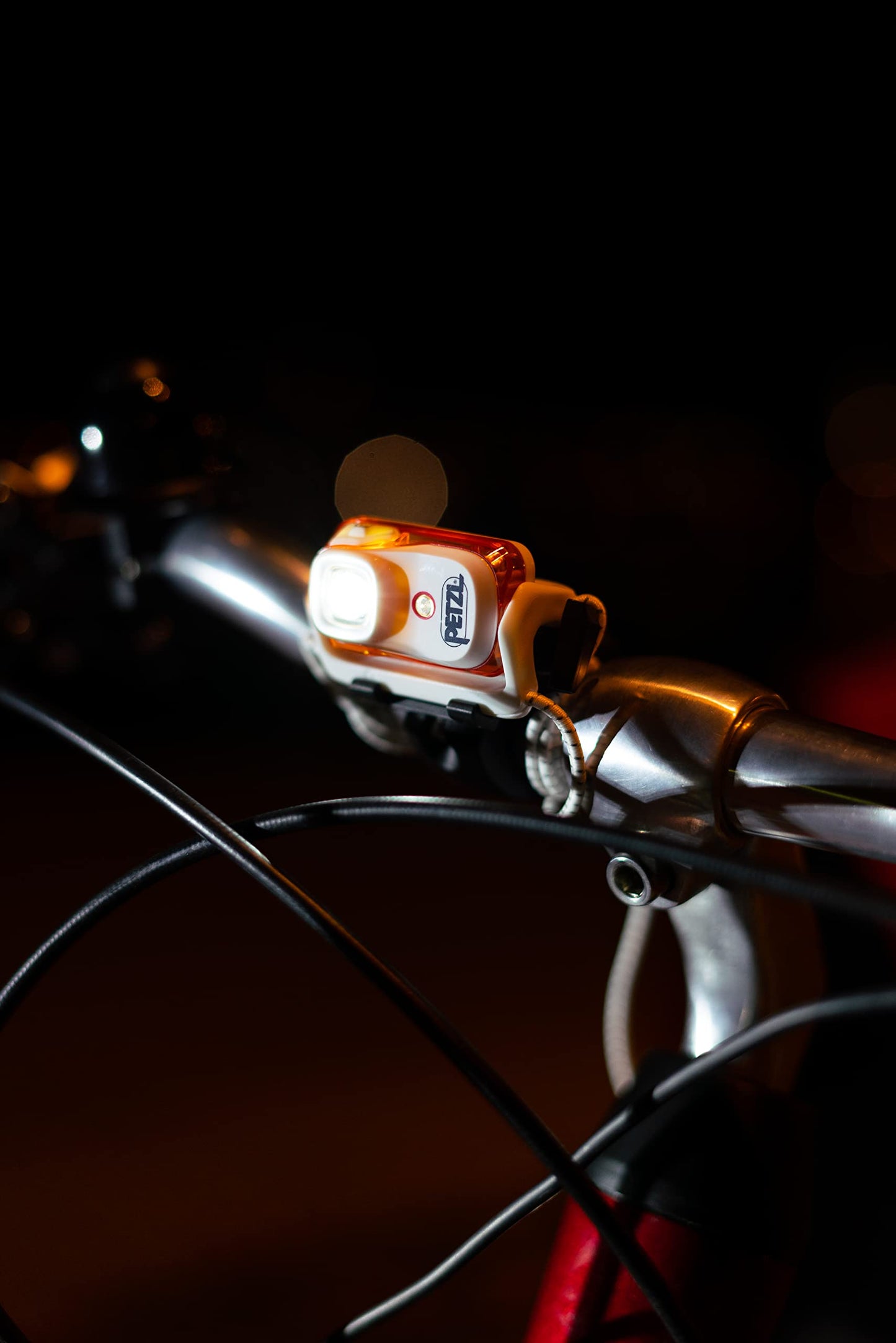 PETZL BINDI Headlamp - 200 Lumen, Ultra-Compact, Rechargeable, Plastic, Size: zzzz-s, Orange, Model: E102AA01