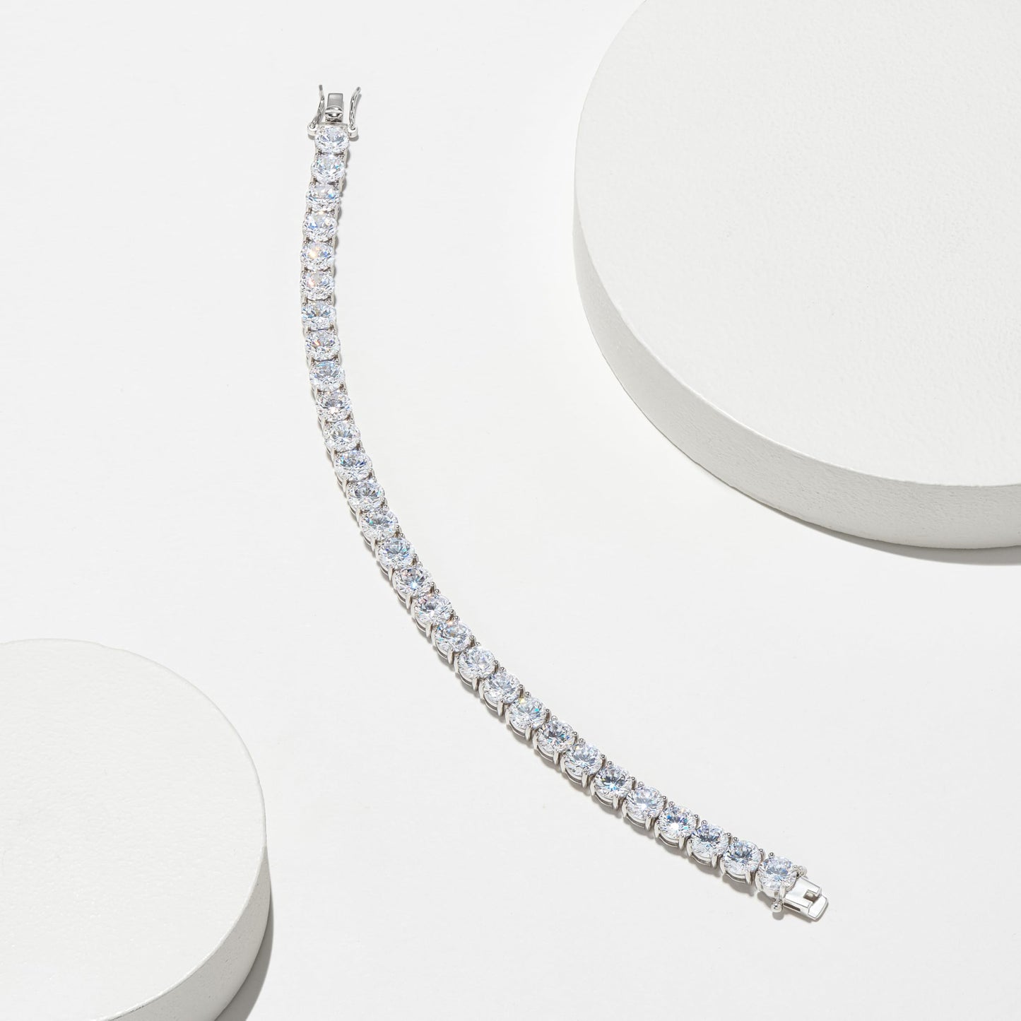 Amazon Essentials Platinum Plated Sterling Silver Round Cut Cubic Zirconia Tennis Bracelet (4mm), 7.5 (previously Amazon Collect