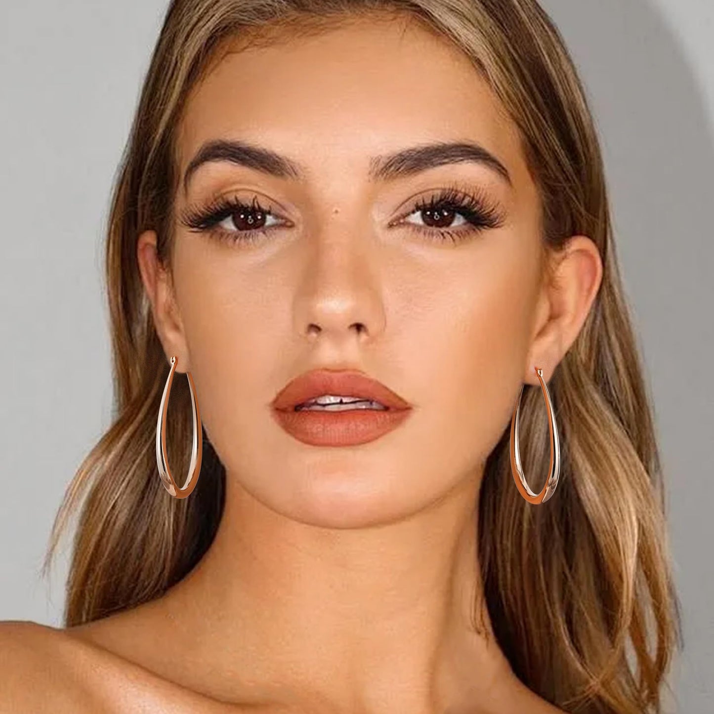 Gacimy Rose Gold Chunky Hoop Earrings for Women, 14K Rose Gold Plated Oval Hoop Big Earrings with 925 Sterling Silver Post, 50mm