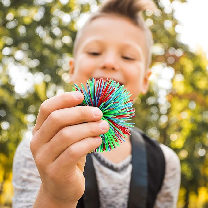 Leinuosen 12 Pieces Monkey Stringy Balls Sensory Stringy Ball Soft Rainbow Pom Bouncy Stress Bags Stuffers Party Favors Birthday Gifts, Multicolor (2.75 Inch)