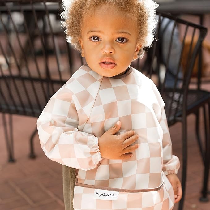 Tiny Twinkle Long Sleeve Bib for Babies & Toddlers – Waterproof Smock Bib for Eating – Machine Washable & Mess-Proof, Baby Feeding Essential & Shower Must-Have(Checkers Brown, 6–24M)