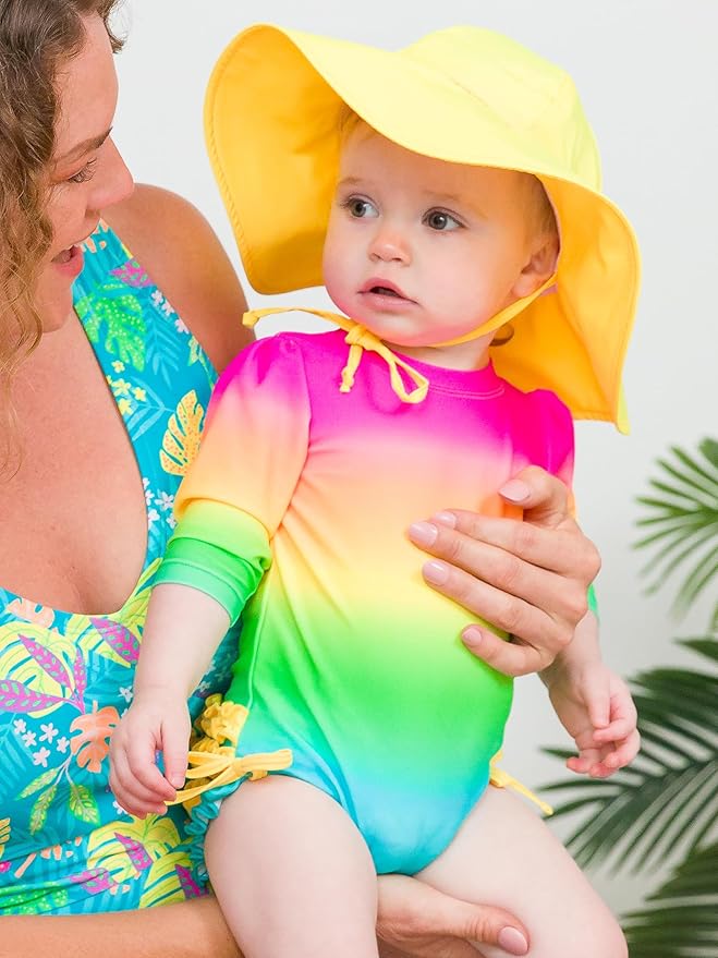 RuffleButts Baby Girls UPF 50+ Sun Protection Novelty Print Long Sleeve One Piece Rash Guard Swimsuit with Zipper