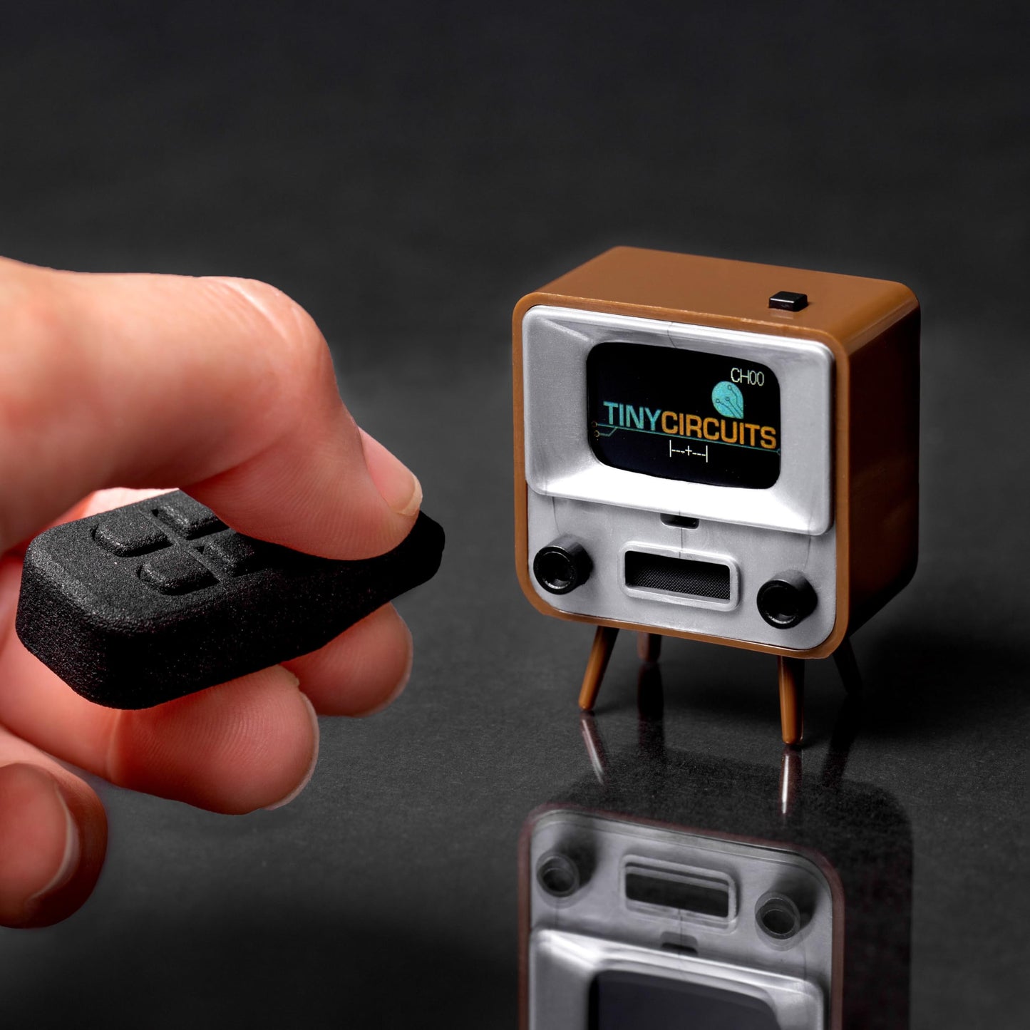 TinyCircuits TinyTV 2 Portable Retro Mini TV – 1.14″ IPS Screen, Preloaded & Uploadable Videos, USB-C Rechargeable, Knob Controls + Tiny Remote (Brown)