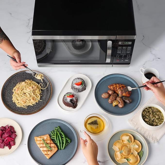 Farberware 1.1 Cu. Ft. Countertop Microwave Oven – 1000 Watt Power, Auto Cook Settings, Defrost, Easy Clean and Child Safety Lock - Stainless