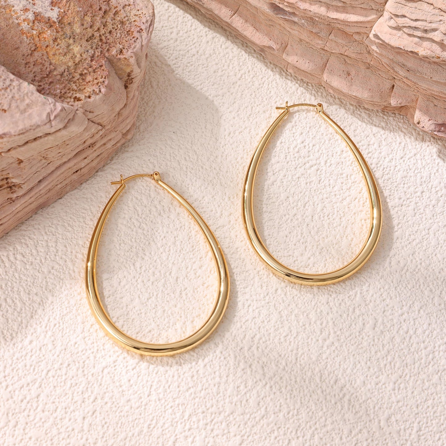 Gacimy Gold Chunky Hoop Earrings for Women, 14K Gold Plated Oval Hoop Big Earrings with 925 Sterling Silver Post, 60mm Yellow Co