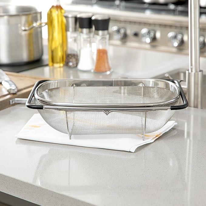 Restaurantware Colander 1 Count 5.5 qt Dishwasher-Safe Stainless Steel Coarse Mesh Colander with Over-The-Sink Expandable Handles Kitchen Strainer Basket for Pasta, Fruits, and Vegetables