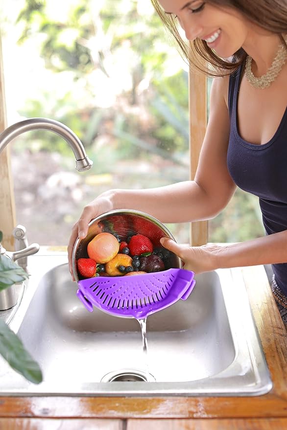 Clip On Kitchen Food Strainer for Spaghetti, Meat, Pasta, & Ground Beef Grease, Colander & Sieve Snaps or Clips Onto Bowls, Pots & Pans Includes Silicone Drainer, Brush & Garlic Peeler (Purple)