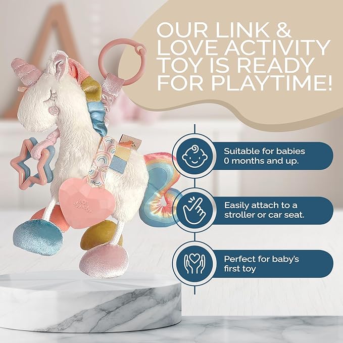 Itzy Ritzy Link & Love Toy for Stroller or Car Seat; Features Textured Ribbons, Crinkle Sounds, Clinking Rings & Silicone Teether; Designed For Ages 0 Months and Up (Unicorn)