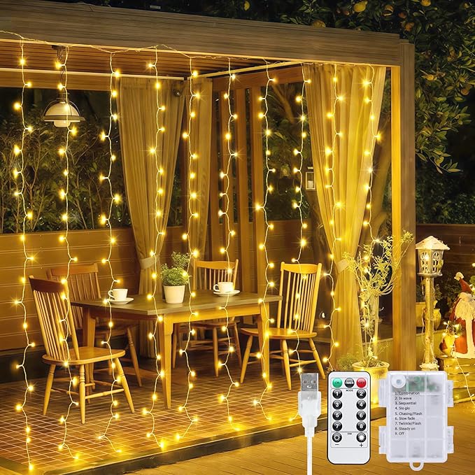 JMEXSUSS 200 LED Christmas Curtain Lights Battery Operated & USB Plug in, 8 Modes Warm White Curtain String Lights for Bac...