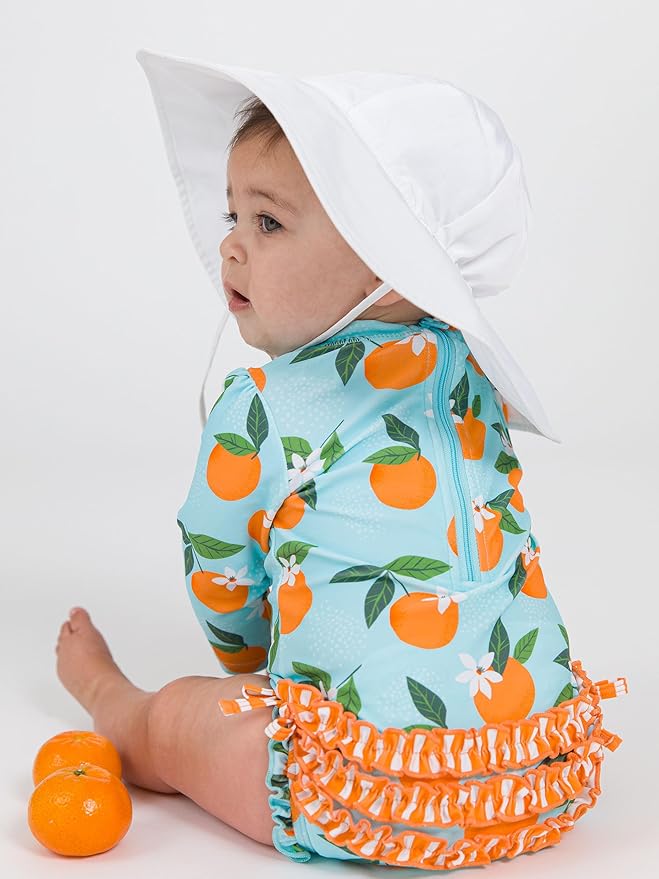RuffleButts Baby Girls UPF 50+ Sun Protection Novelty Print Long Sleeve One Piece Rash Guard Swimsuit with Zipper