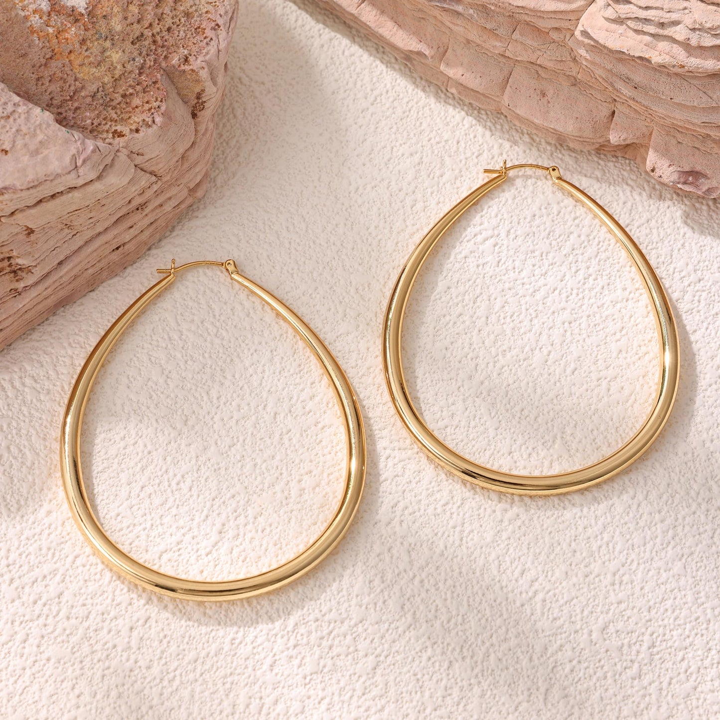 Gacimy Gold Chunky Hoop Earrings for Women, 14K Gold Plated Oval Hoop Big Earrings with 925 Sterling Silver Post, 70mm Yellow Co
