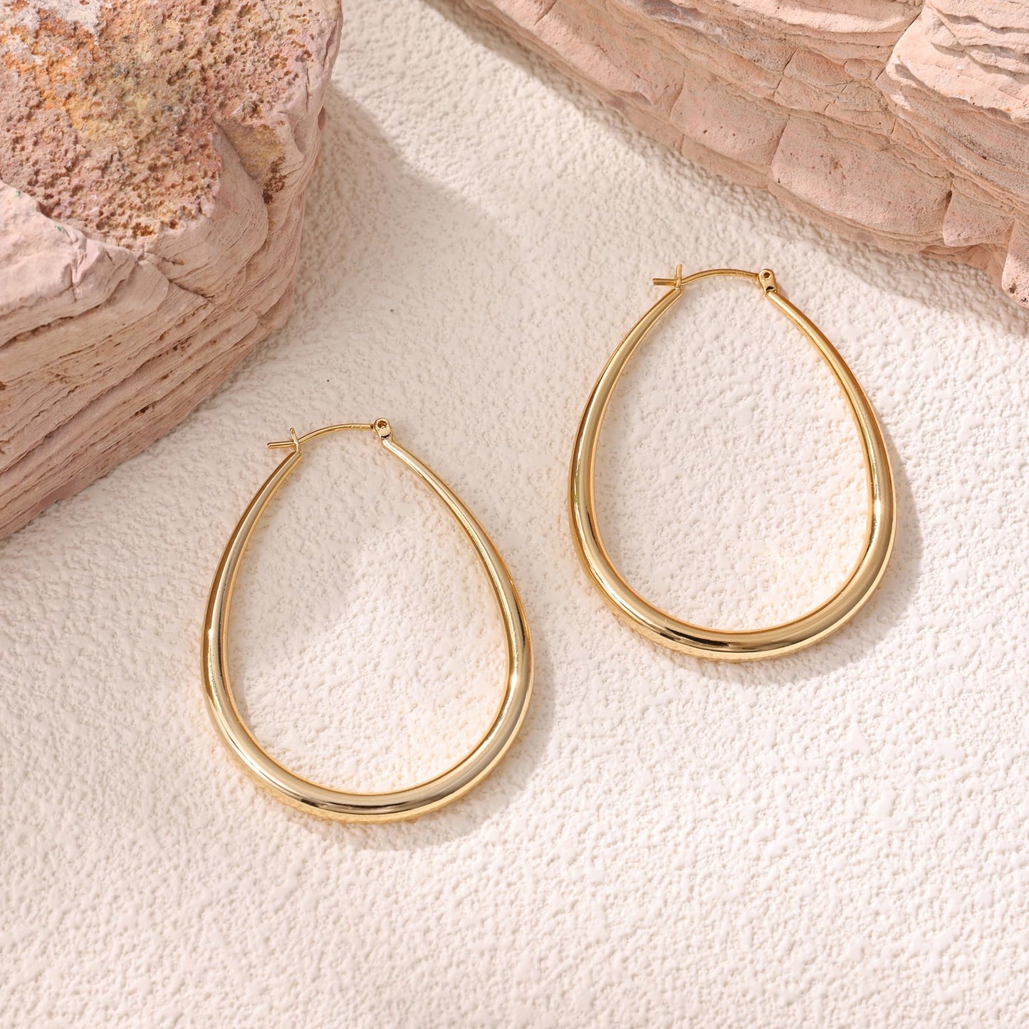 Gacimy Gold Chunky Hoop Earrings for Women, 14K Gold Plated Oval Hoop Big Earrings with 925 Sterling Silver Post, 50mm Yellow Co