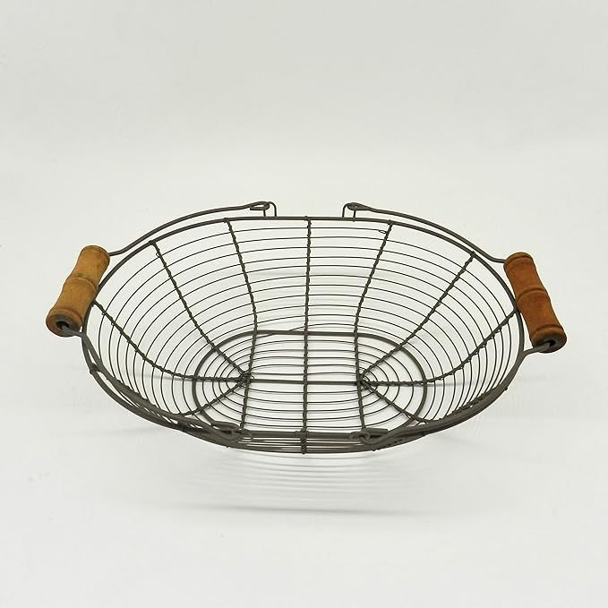 CVHOMEDECO. Oval Metal Wire Egg Basket Wire Basket with Wooden Handle Country Vintage Style Storage Basket. Rusty, 13 X 9 X 3-1/2 Inch