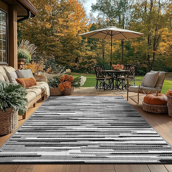 GENIMO Outdoor Rug for Patio Clearance, 6'x9' Waterproof Camping Mat, Reversible Plastic Straw Rugs for RV, Camper, Balcony, Backyard, Picnic, Deck (Black White)